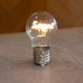 Bomboniera di Laurea a forma di Lampadina Led scritta "Sogni" e simbolo