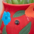 Vaso Portafiori Rosso con Fiori Arancio e Blu