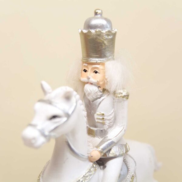 Schiaccianoci a cavallo decoro bianco e oro Schiaccianoci a cavallo decoro bianco e oro