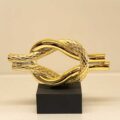 Scultura "Nodo Infinito" su Base Colorata
